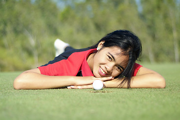 Image showing Female golf player on green