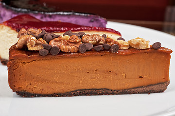 Image showing cheesecake with chocolate and nuts