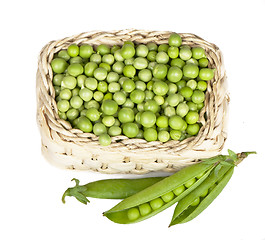 Image showing Basket with green peas