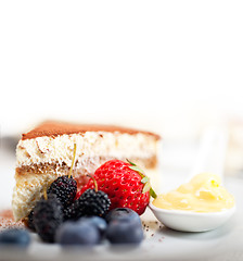 Image showing tiramisu dessert with berries and cream