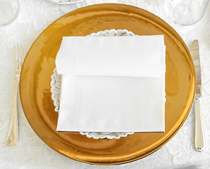 Image showing Golden plate in wedding catering