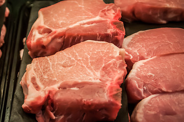 Image showing fresh raw pork chops at the butcher