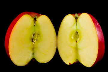 Image showing sliced apples on black background