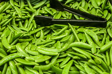 Image showing Freshly harvested peas on display at the farmers market