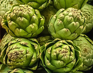 Image showing Pile of Artichoke on display at a farmers market