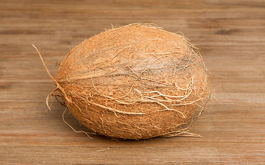 Image showing Coconut on wood