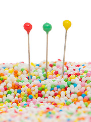 Image showing Straight pins in candy