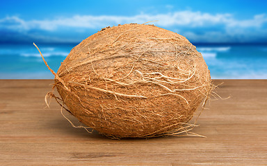 Image showing Coconut on wood