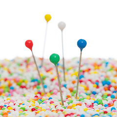 Image showing Straight pins in candy