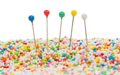 Image showing Straight pins in candy