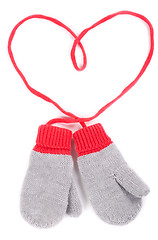 Image showing pair of gray baby mittens on a string in the form of heart