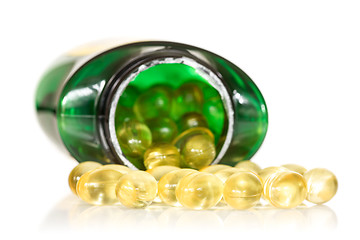 Image showing Fish oil scattering on white background