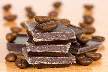 Image showing Chocolate  and coffee beans on the table