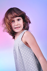 Image showing  pretty 8 year old girl in silver dress