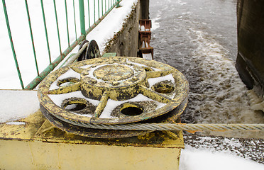 Image showing dam mechanism steel cable snow river water winter 