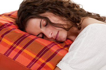 Image showing Woman Sleeping in a Red Pillow