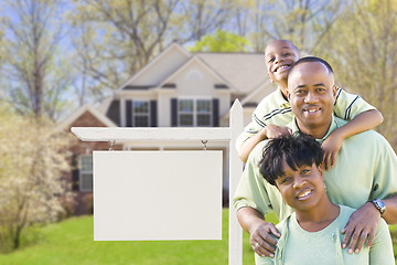 Image showing African American Family In Front of Blank Real Estate Sign and H