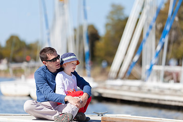 Image showing family at a marina dock