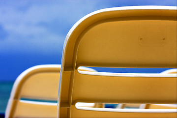 Image showing two old   plastic chair  in the sky