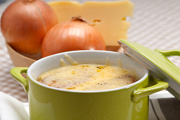 Image showing onion soup with melted cheese and bread on top