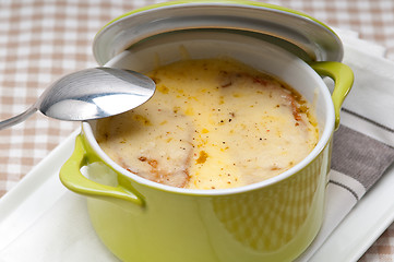 Image showing onion soup with melted cheese and bread on top