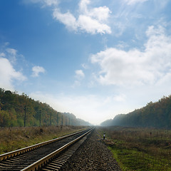 Image showing railroad in fog to horizon