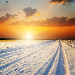 Image showing winter landscape. sunset over road with snow