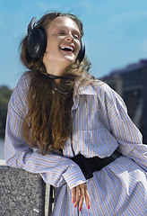 Image showing face of girl with head-phones