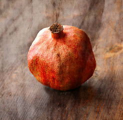 Image showing Vintage background with old dry pomegranate