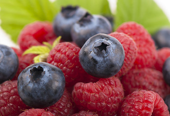 Image showing Many blueberries & raspberries.