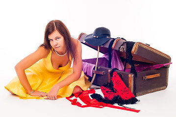 Image showing Pretty girl with suitcase