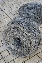 Image showing Two bays of barbed wire