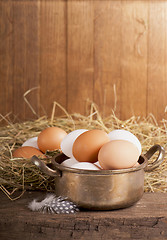 Image showing eggs on old wooden