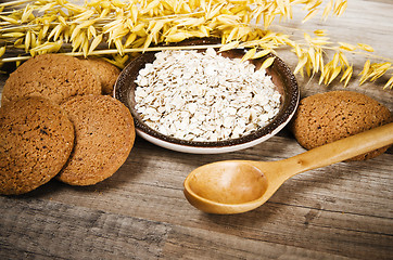 Image showing Oatmeal cookies and cereal on the kitchen table