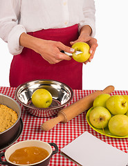 Image showing Peeling apples for pie