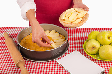 Image showing Decorating apple pie