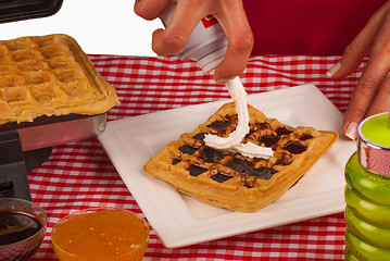 Image showing Cream on waffles