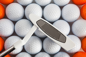 Image showing Golf putter and balls