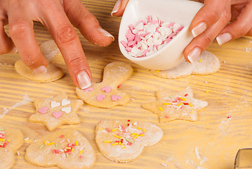 Image showing Decorating cookies