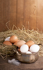 Image showing eggs on old wooden background