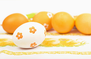 Image showing Easter eggs on the embroidered cloth