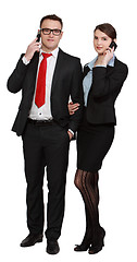 Image showing Young Business Couple on the Phones