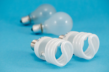 Image showing two pair of light bulbs  new fluorescent heat bulb 