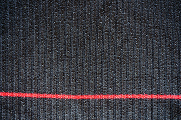 Image showing black wool texture red vertical line background 