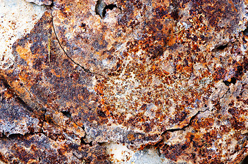 Image showing uneven cracked tin rust stains background 
