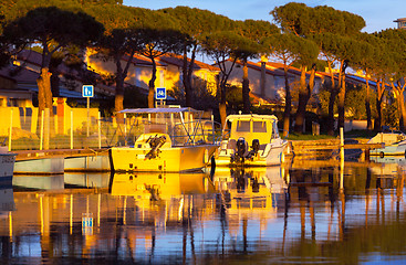 Image showing Boats in a marina at sunset