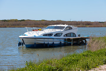 Image showing Luxury pleasure boat moored at the pier