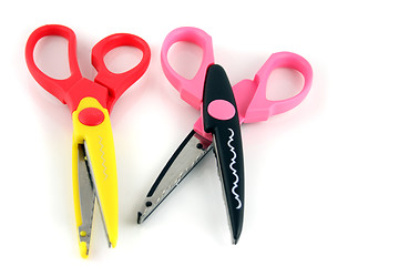 Image showing Brightly colors craft scissors on a white background