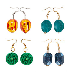 Image showing Earrings of the plastic clay isolated on a white background. Collage