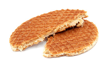 Image showing Stroopwafel, Dutch caramel waffle broken in half